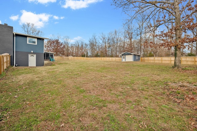129 Dylark Dr, Waverly, TN 37185 - fenced backyard with a shed and a detached garage