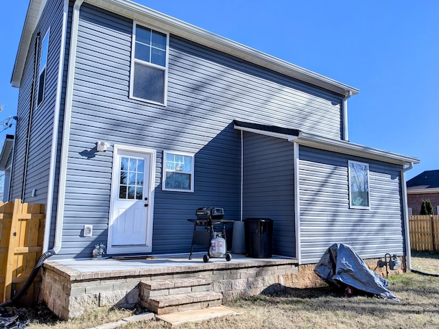 rear view of house with a patio