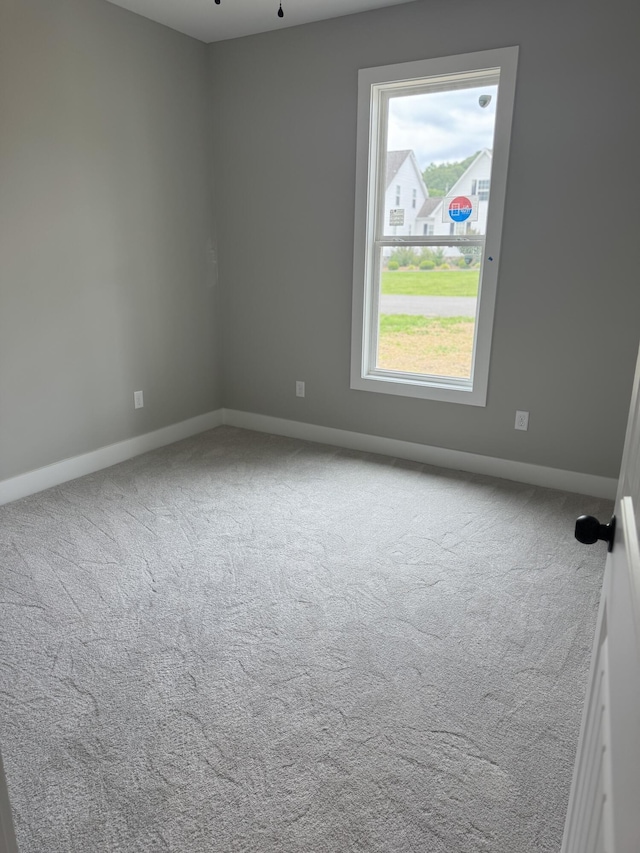 10 Shagbark Cv, Dunlap, TN 37327 - empty room featuring carpet and baseboards