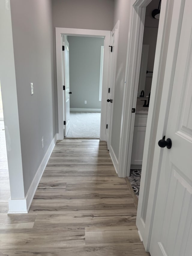 10 Shagbark Cv, Dunlap, TN 37327 - hallway featuring light wood-type flooring and baseboards