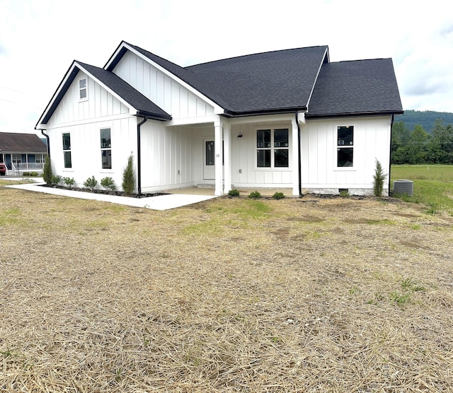 10 Shagbark Cv, Dunlap, TN 37327 - modern farmhouse with board and batten siding, roof with shingles, and central air condition unit