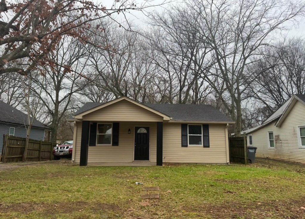 bungalow with a front yard