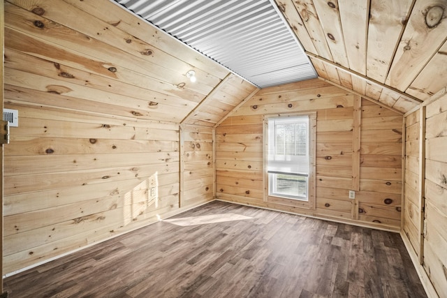 additional living space featuring wood ceiling, lofted ceiling, wood-type flooring, and wooden walls