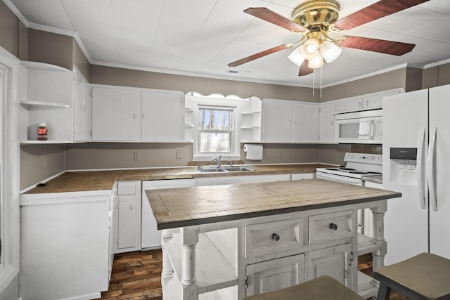 kitchen with sink, white cabinets, white appliances, and ornamental molding