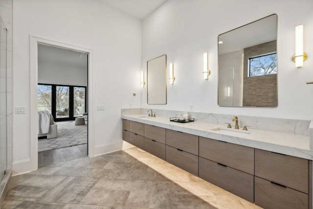 bathroom with vanity and plenty of natural light