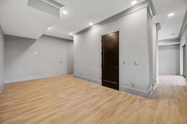 basement featuring light hardwood / wood-style flooring