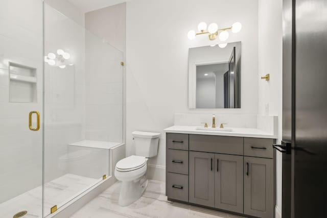 bathroom featuring vanity, toilet, and walk in shower