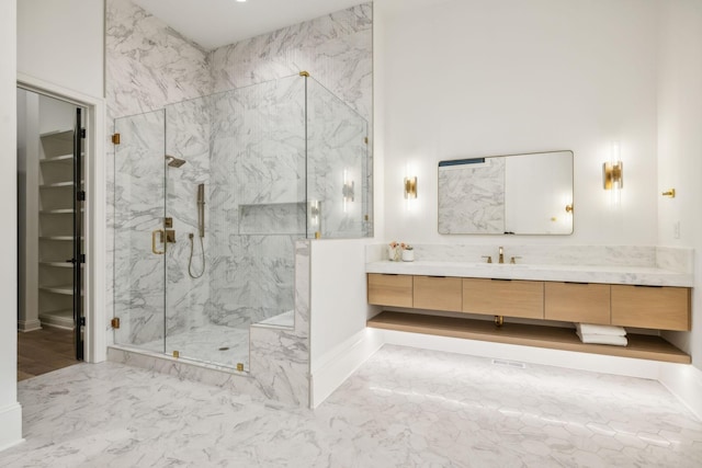 bathroom with vanity and an enclosed shower