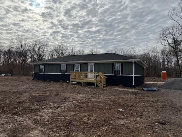 view of front of home with a deck