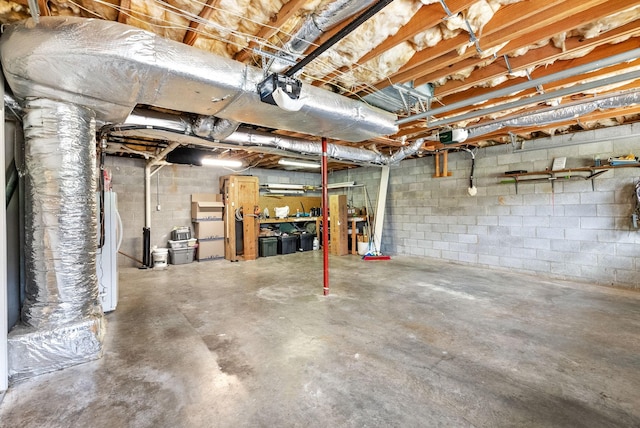 basement featuring white fridge