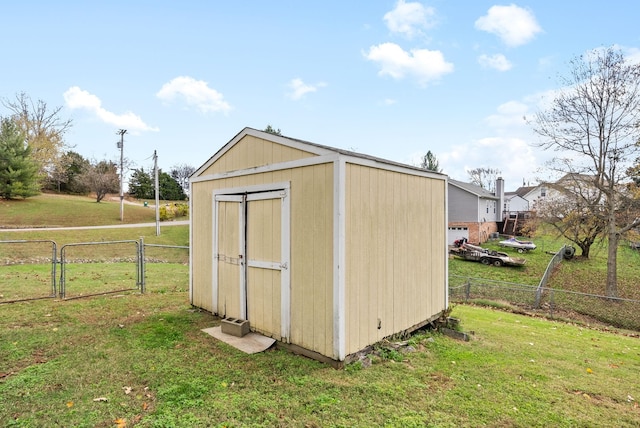 view of outdoor structure with a yard