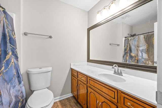 bathroom featuring a shower with shower curtain, vanity, wood-type flooring, and toilet