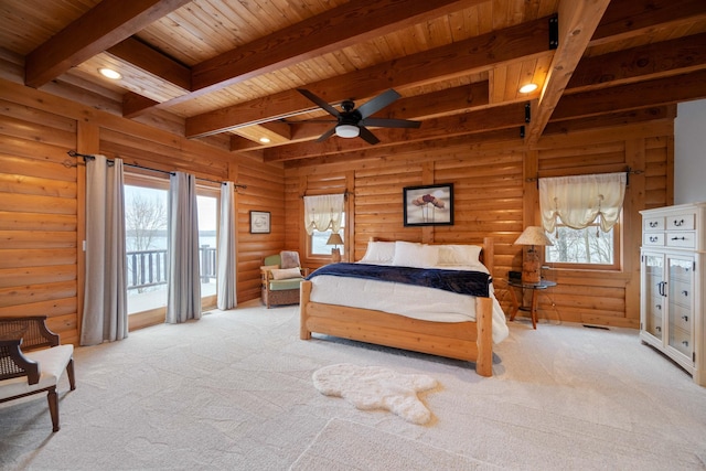 carpeted bedroom featuring wooden ceiling, ceiling fan, access to exterior, log walls, and beam ceiling