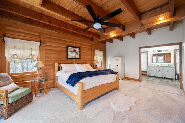 bedroom featuring beamed ceiling, ceiling fan, wood ceiling, and light carpet