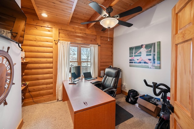 carpeted office space with ceiling fan, wood ceiling, and log walls