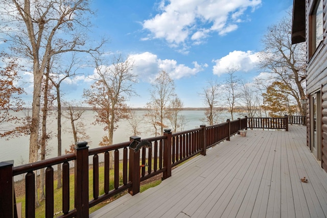 wooden deck with a water view