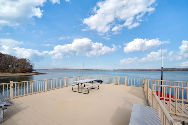 view of patio with a water view