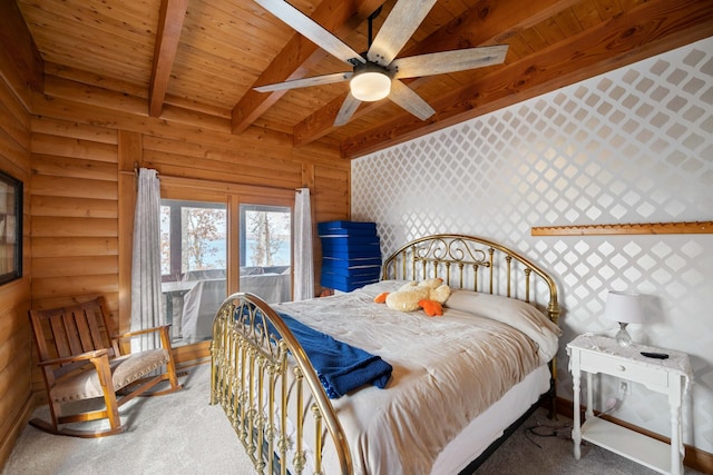 bedroom featuring ceiling fan, beam ceiling, wood ceiling, and carpet floors