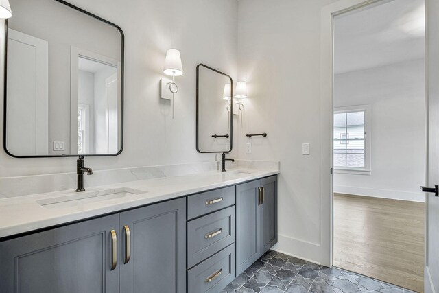 bathroom featuring hardwood / wood-style floors and vanity