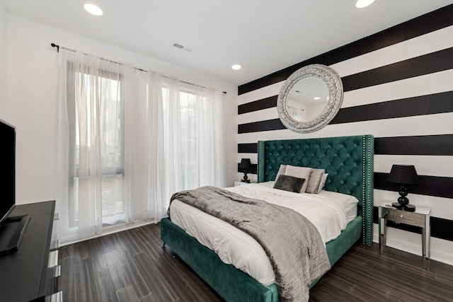 bedroom featuring dark wood-type flooring