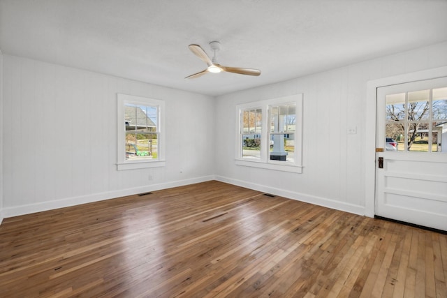 interior space with hardwood / wood-style flooring and ceiling fan