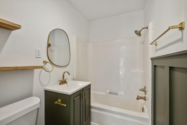 full bathroom with bathtub / shower combination, vanity, and toilet