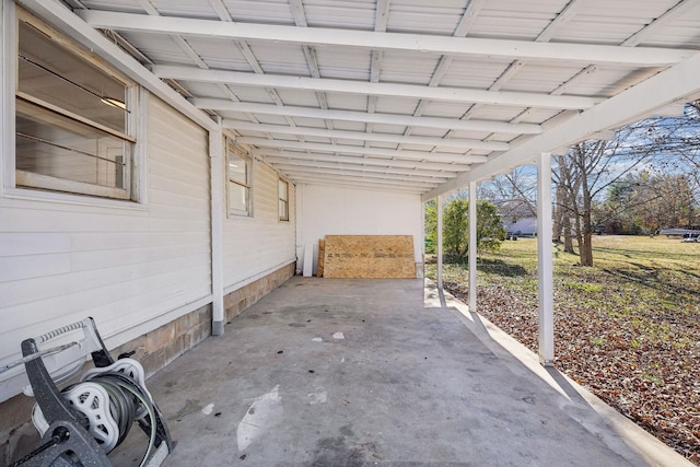 view of patio featuring a carport