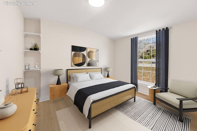 bedroom featuring light hardwood / wood-style floors