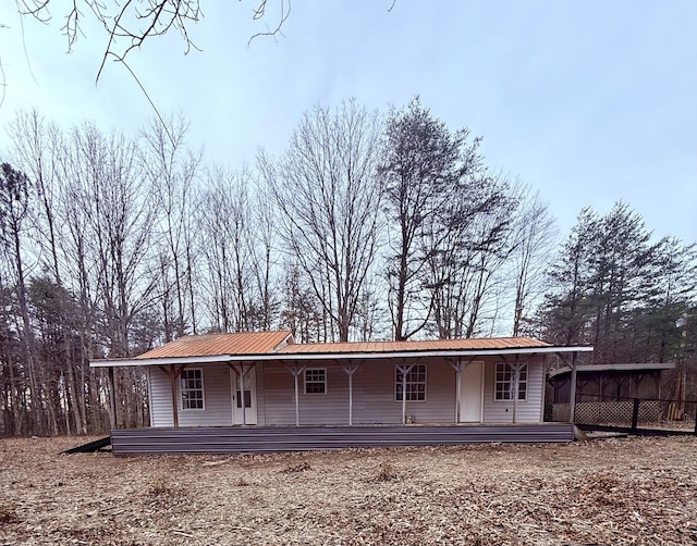 exterior space featuring a carport