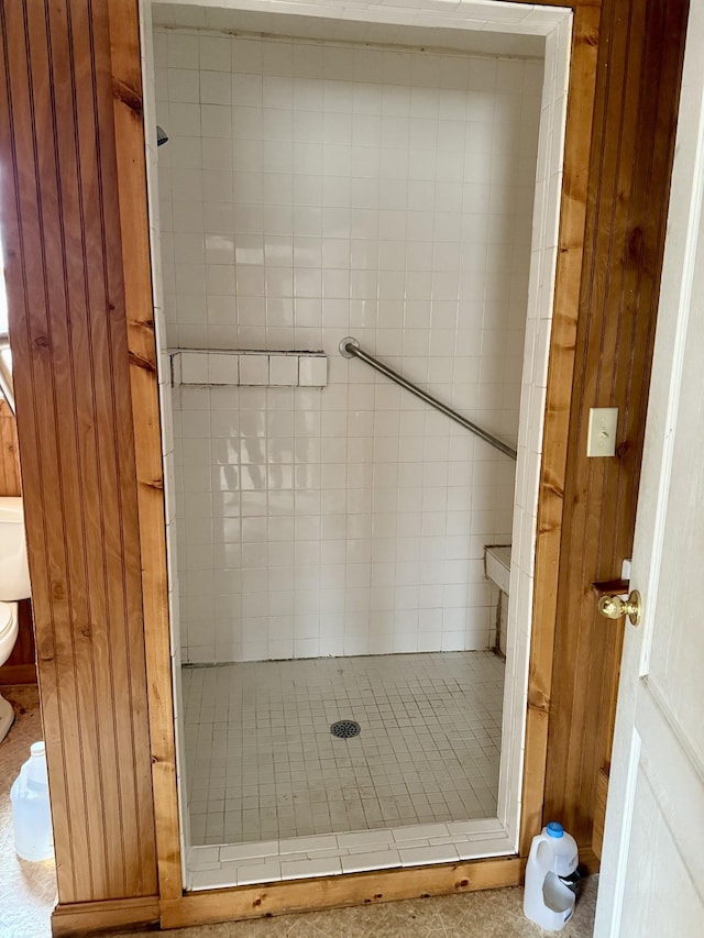 bathroom with tiled shower