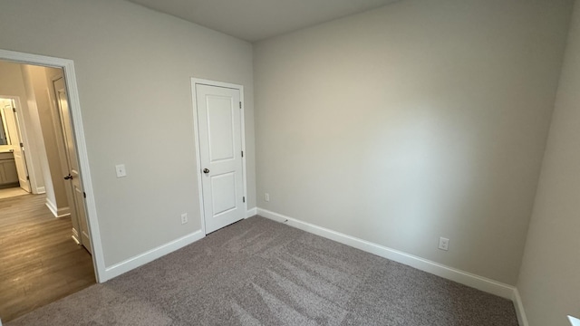 unfurnished bedroom with carpet