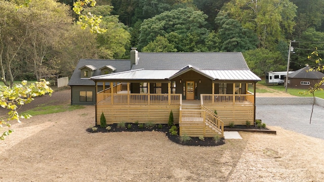 view of front of property featuring covered porch