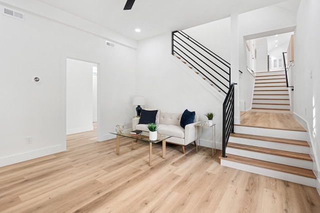 sitting room featuring light hardwood / wood-style flooring