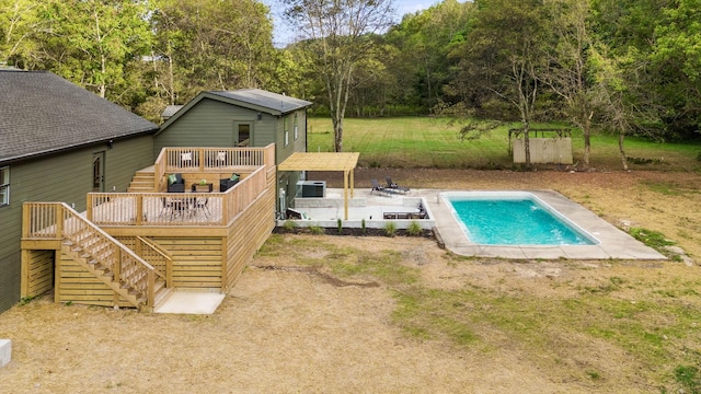 view of pool with a patio area and central AC