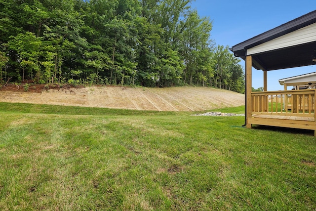 view of yard with a deck