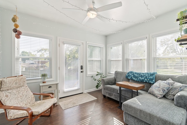 sunroom / solarium featuring a wealth of natural light and ceiling fan