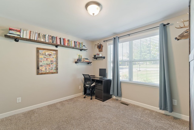 view of carpeted office space