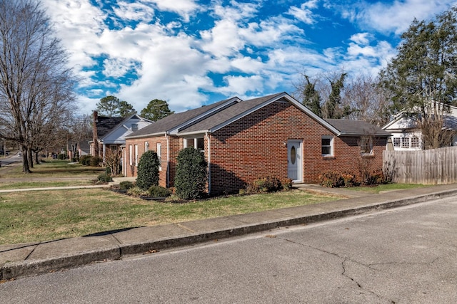 view of home's exterior featuring a yard