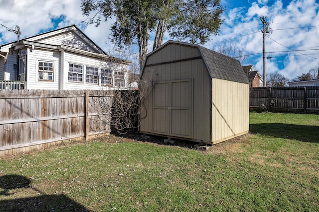 view of outdoor structure with a lawn