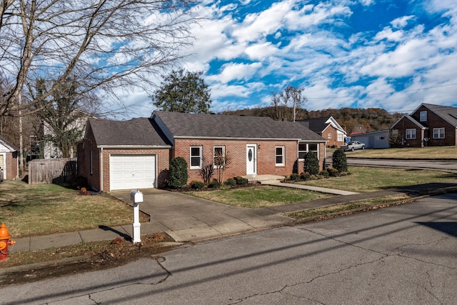 single story home featuring a front yard and a garage