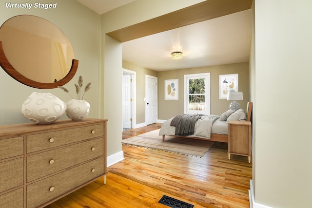 bedroom featuring light hardwood / wood-style floors