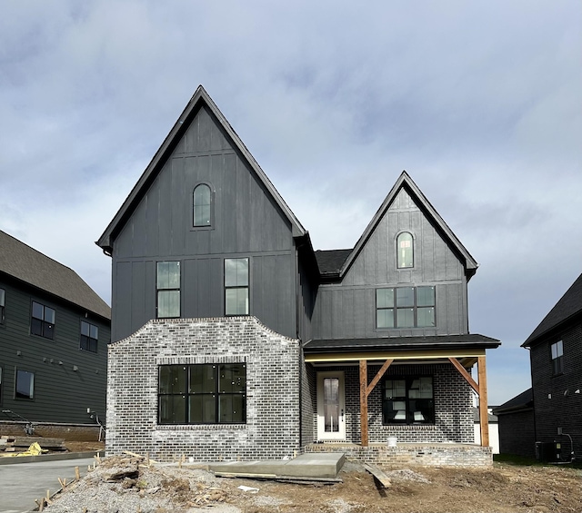 view of front of home with cooling unit