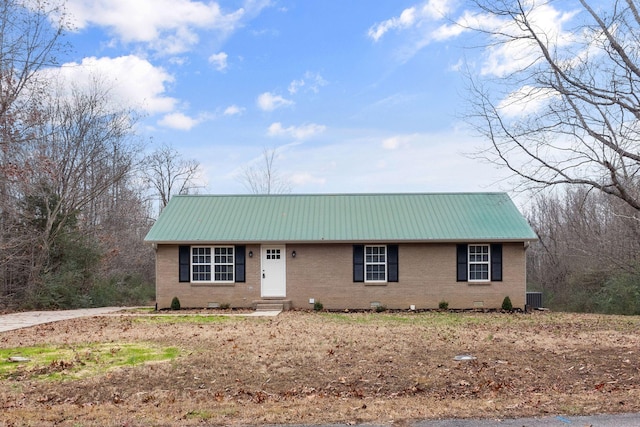 single story home featuring central AC unit