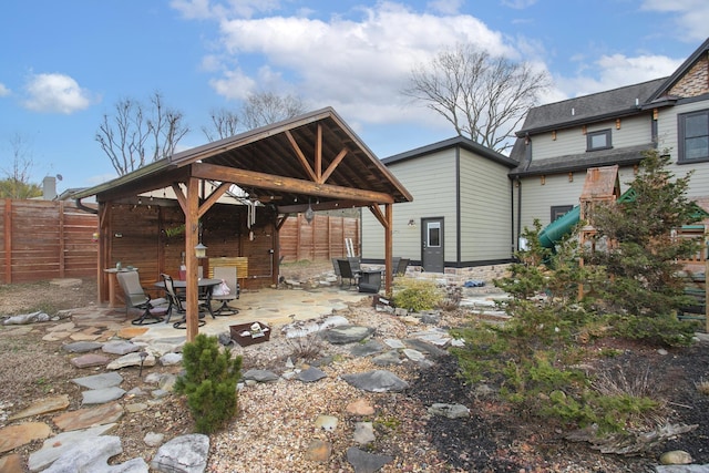 view of patio featuring a playground