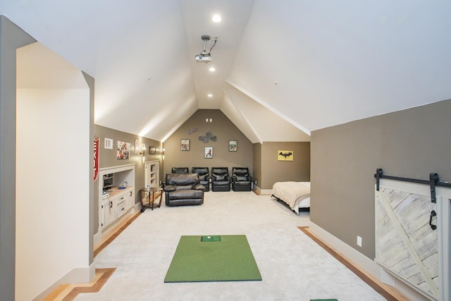 rec room with vaulted ceiling and carpet