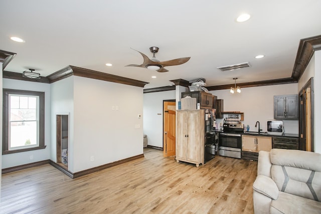 living room with sink, ornamental molding, light hardwood / wood-style floors, and ceiling fan