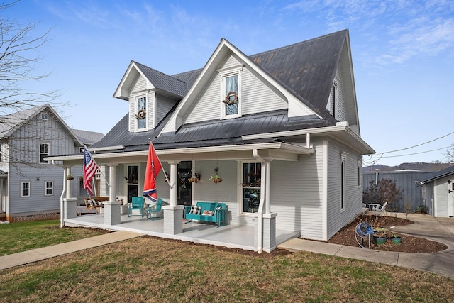 view of front of home with a front yard