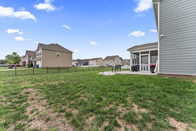 view of yard with a patio area and a sunroom