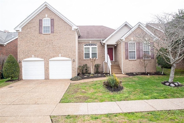 front of property featuring a garage and a front lawn