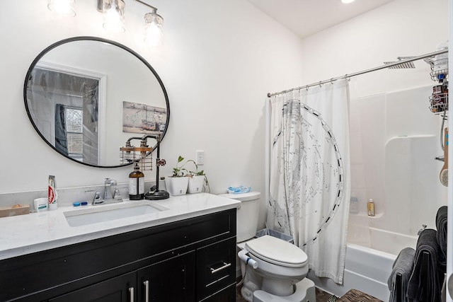 full bathroom featuring vanity, toilet, and shower / bath combo with shower curtain